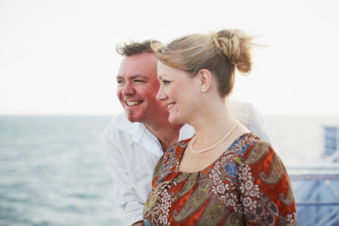 Two passengers on board a DFDS ship look at the ocean