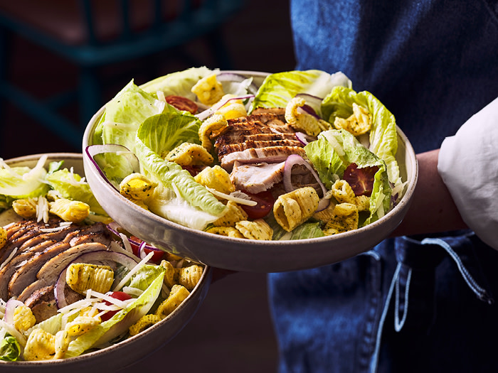 Caesar Salad with corn snacks