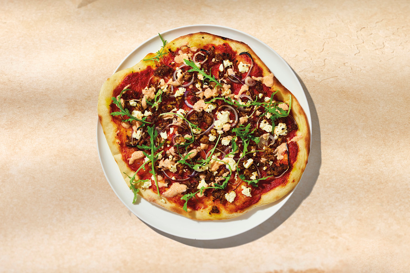 Chicken shawarma pizza with harissa yoghurt