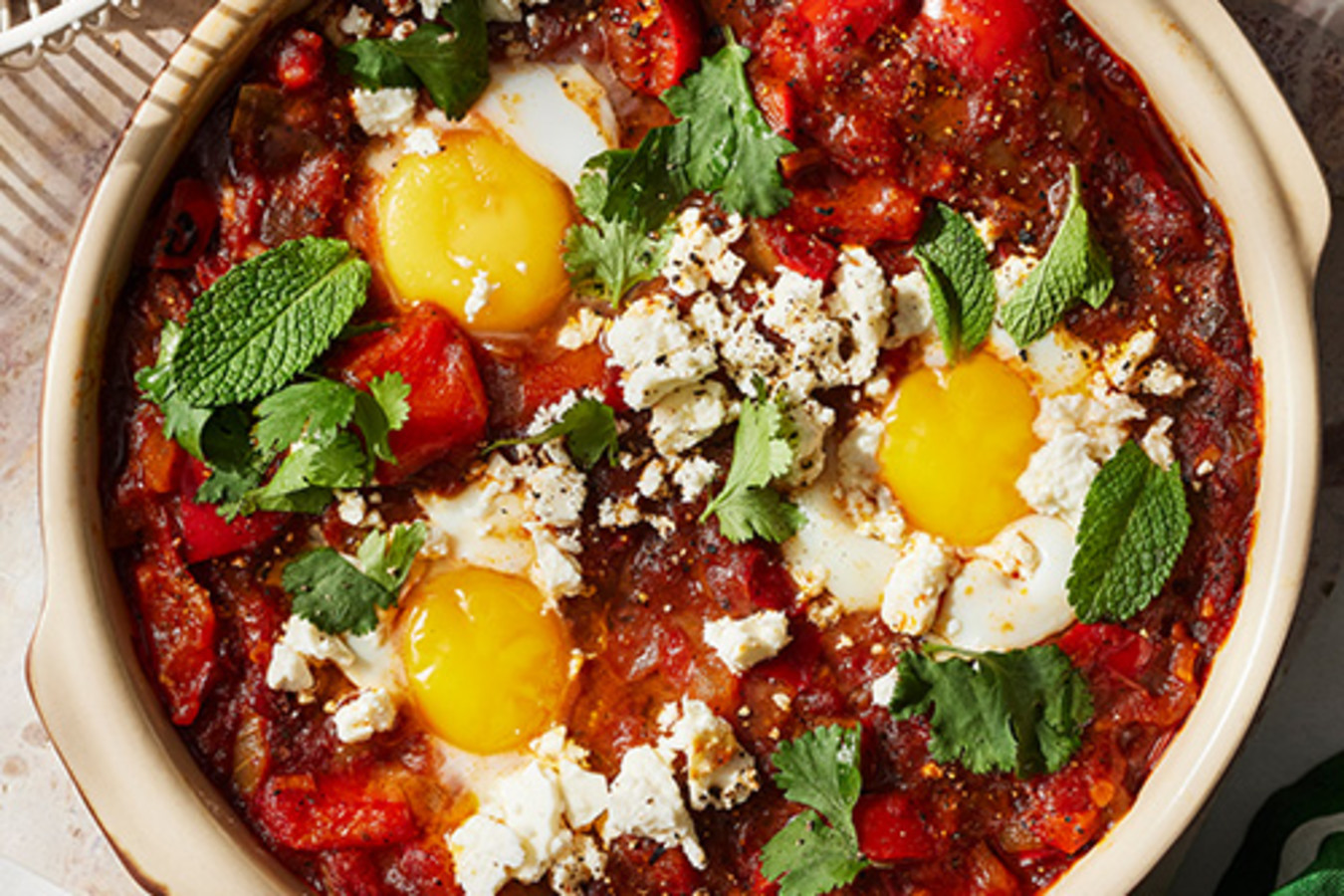 Cook greens in crushed tomatoes