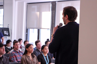 Speaker addressing a team
