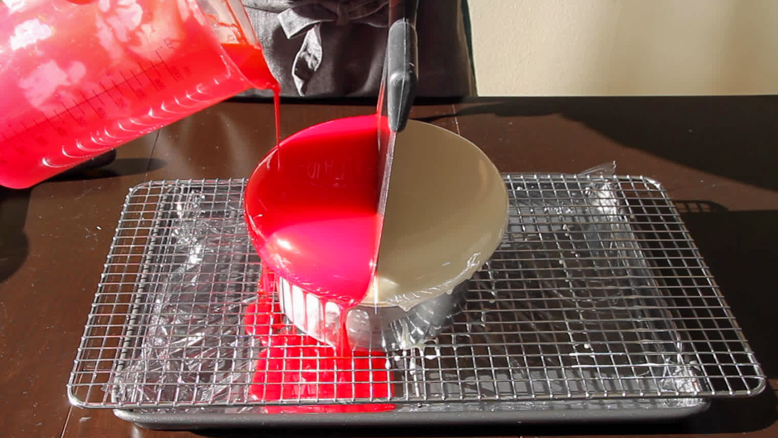 pour-red-mirror-glaze-over-entremet