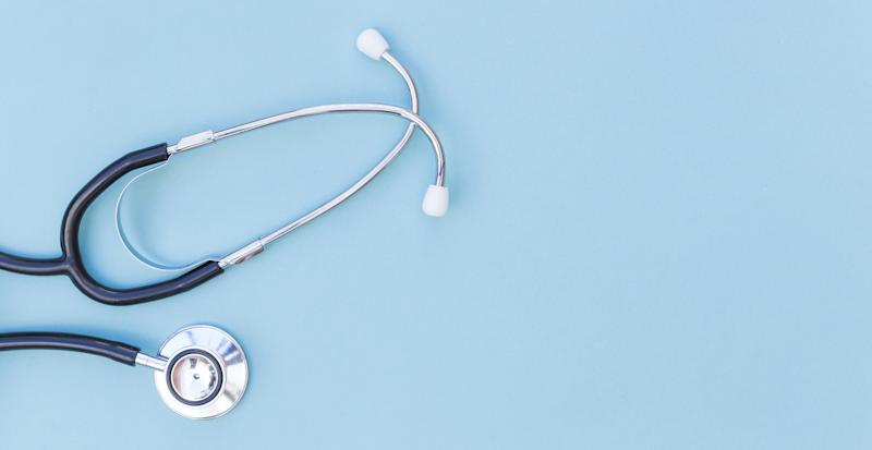 stethoscope on blue background