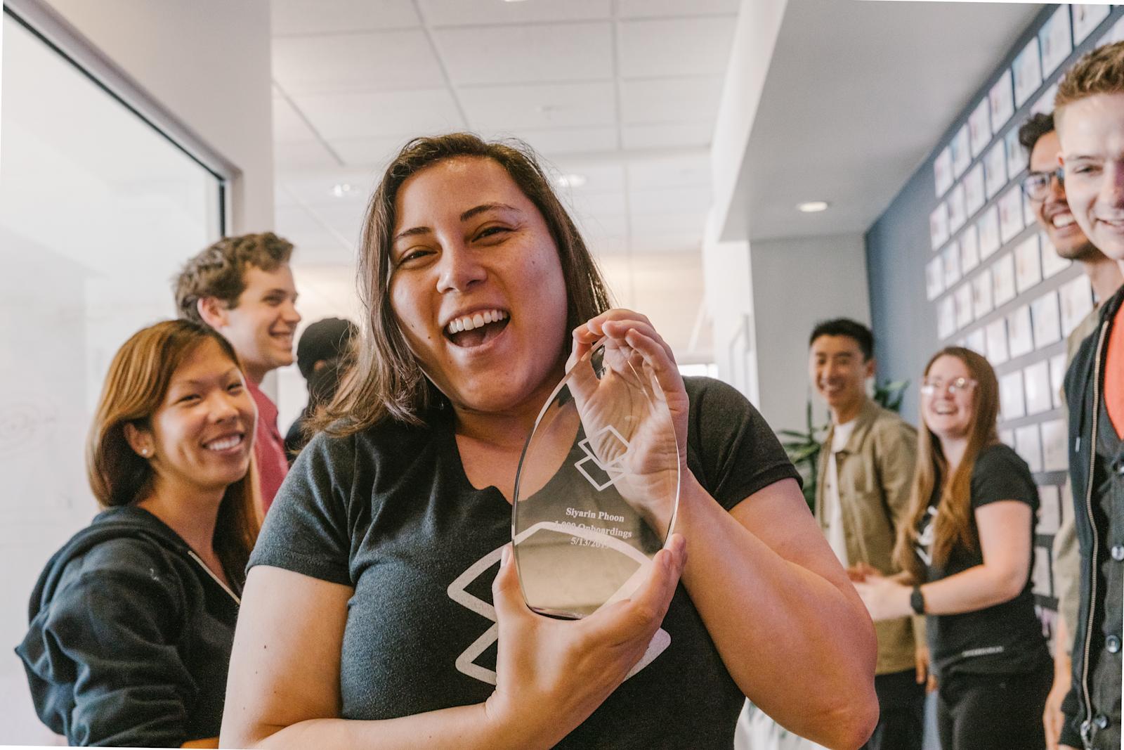 siyarin poon celebrating her 1000th onboarding at superhuman