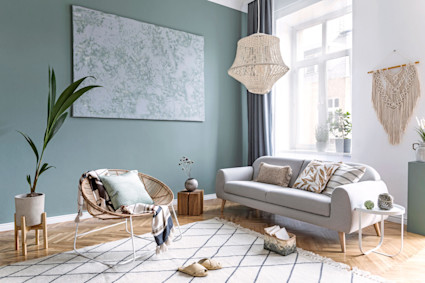 a living room with a couch and a chair