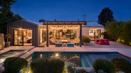 Poolhouse exterior with outdoor seating