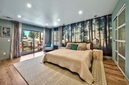 Large master bedroom in tahoe with tree wallpaper