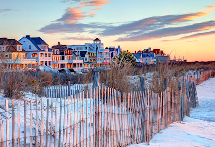 Colorful beachside homes line the coast in Cape May, a historic best beach town on the east coast.