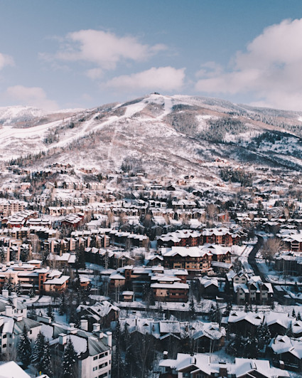 Aerial view of a ski town covered in snow.