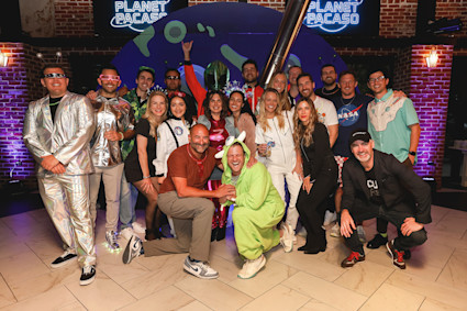 Group of Pacaso employees during off site Planet Pacaso themed party.