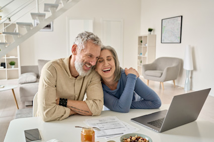 Middle aged couple laughing