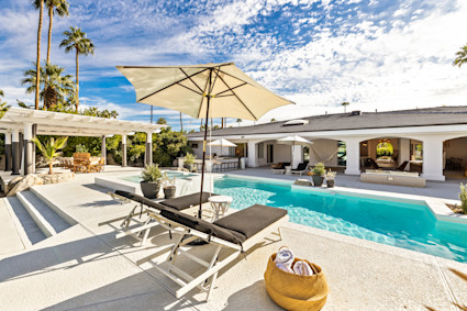 Oasis pool shot with lounge chairs