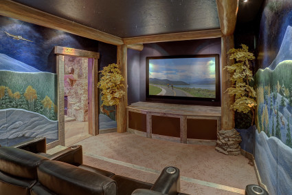 The Chateau Movie Room  with landscape painted walls