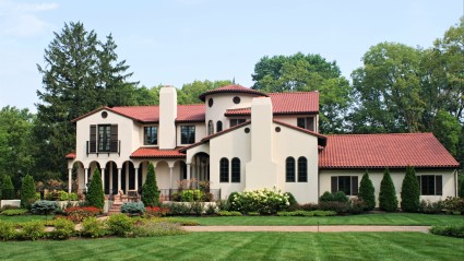 Spanish style home with red roof