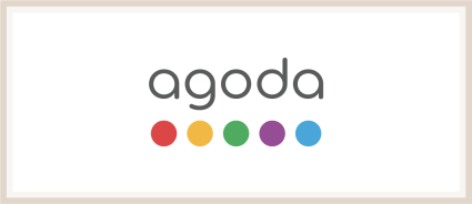 A logo of Agoda, one of the many Plum Guide alternatives.