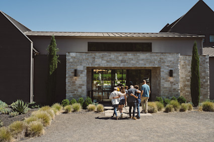 A family arriving to a Pacaso home