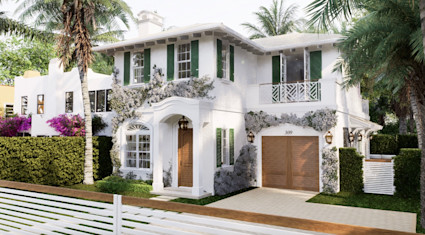Charming white two-story home with green shutters, climbing florals, arched entryway, and lush tropical landscaping.