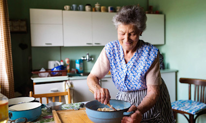 A person mixes batter in a bowl while exploring what to do after retirement.
