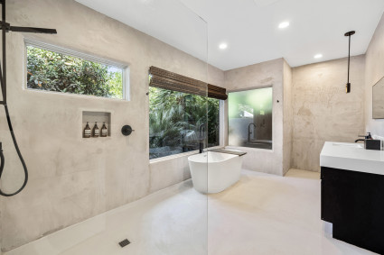 Oasis Bathroom with shower and tub