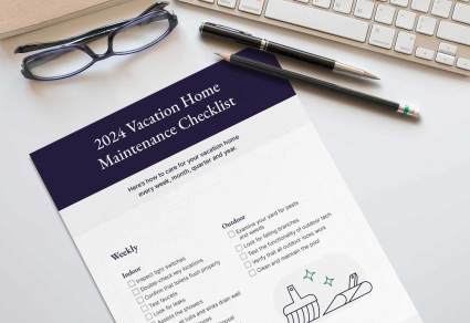 A vacation home maintenance checklist lies near a pen, pencil and a pair of glasses.