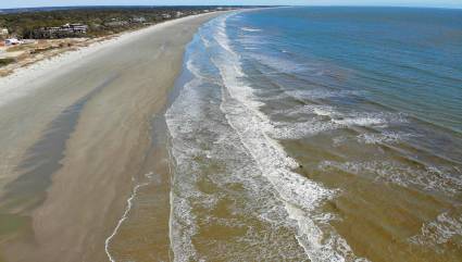 Waves crash against the shore at Kiawah Beachwalker Park, one of the best beaches for kids in the South.