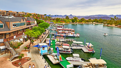 Pontoon boats fill the docks of Lake Havasu City, Arizona, embodying why it’s one of the best places for a second home.