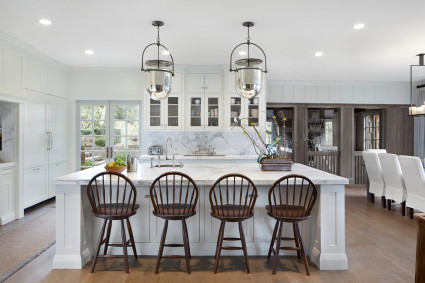large bright kitchen with island seating for four