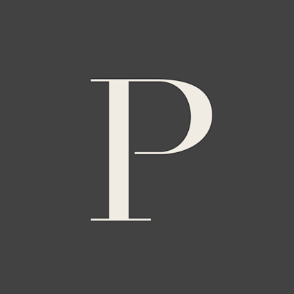 Pacaso script in charcoal.