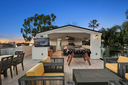 rooftop deck with games and outdoor seating