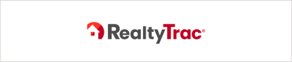 An image of the logo for RealtyTrac, one of the best house buying websites.
