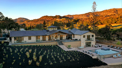 Backyard with pool and house