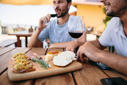 Owners drinking wine