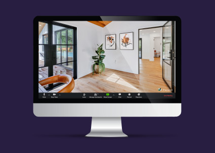 A computer monitor displays a Zoom background that can stand in for a detail-oriented home office setup.