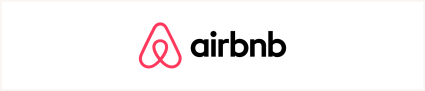 An image shares the logo of Airbnb, one of the best vacation rental sites. 