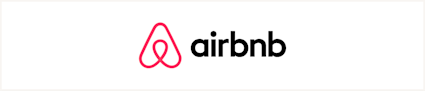 An image shares the logo of Airbnb, one of the best vacation rental sites. 