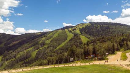 People hiking up Mount Werner, one of the top places for Steamboat Springs summer activities.