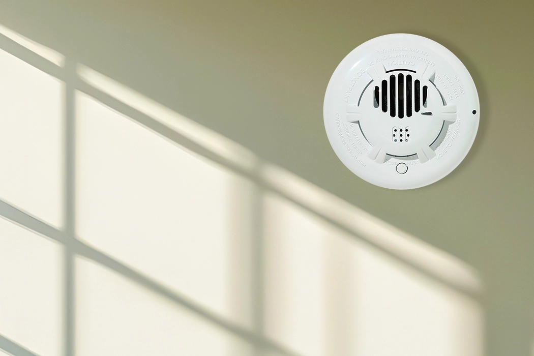 Carbon Monoxide Detector on Wall Demonstrates Carbon Monoxide Smells Like Nothing, Requiring a Detector