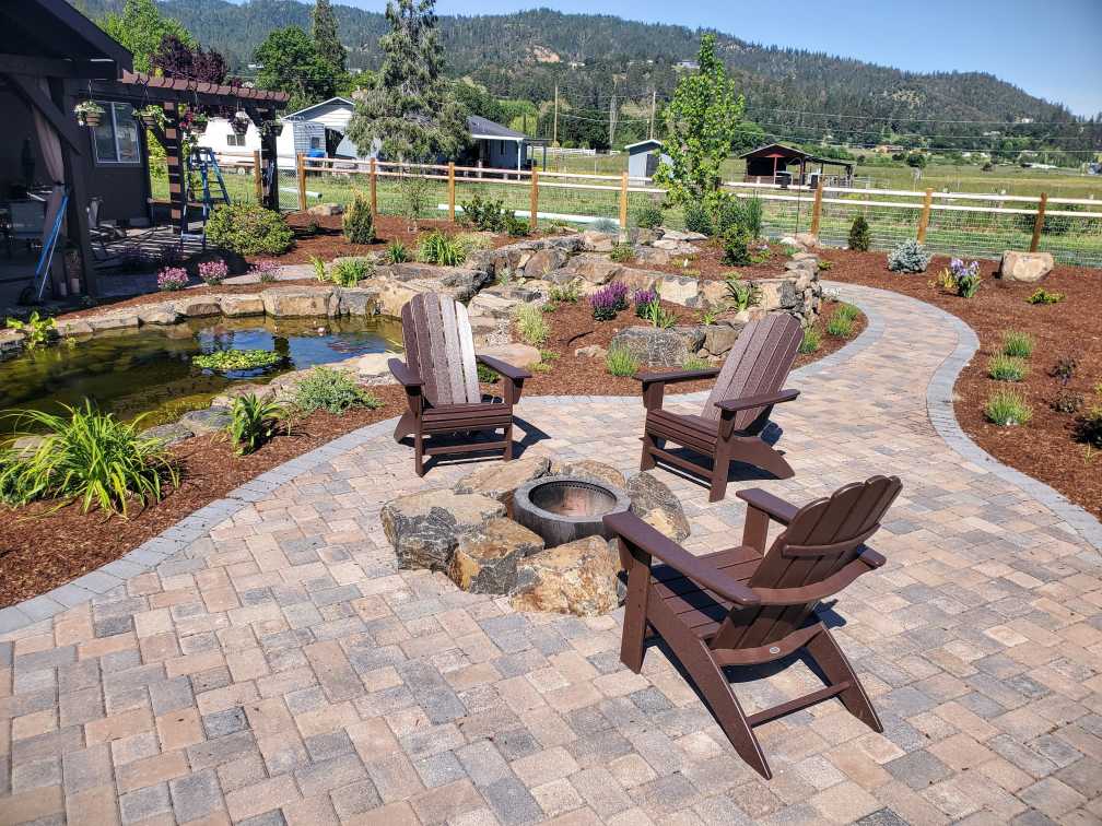 Paver Patio with Firepit by Pond Andreatta Waterscapes Central Point Oregon