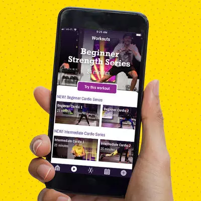mobile phone displaying Planet Fitness app Beginner Strength Series and other workout options