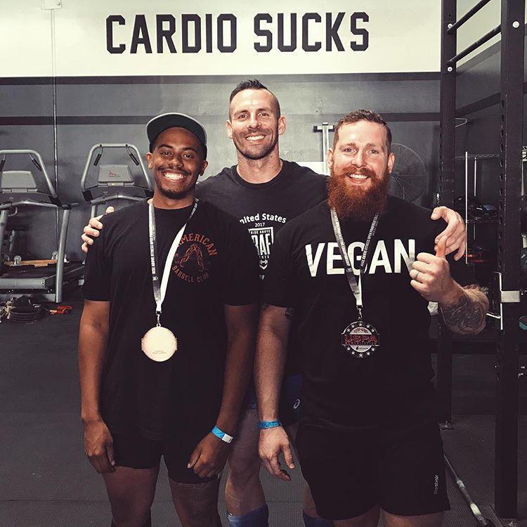 Nick Squires with vegan powerlifters @brillo_avhc and @brooks.cuzick