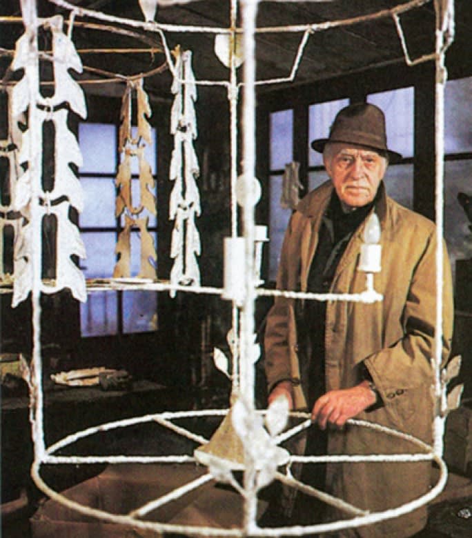 Diego giacometti in his studio working on teh chandelier for the picasso museum