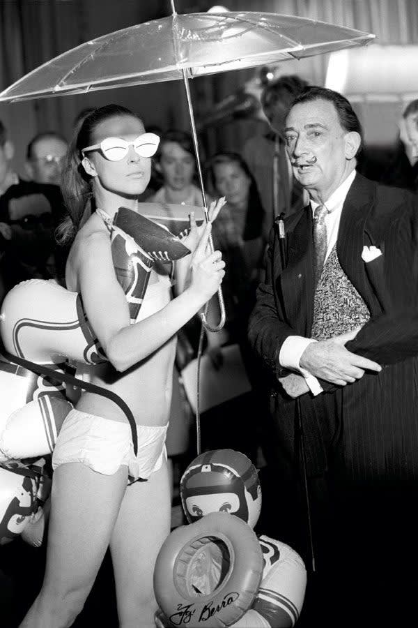  Salvador Dalí , With model wearing his swimwear design, 1965 