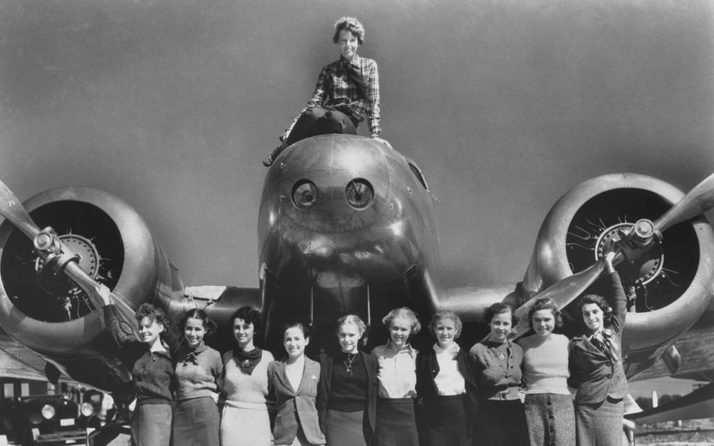  Amelia Earhart and Purdue co-eds, Posing at an Airplane 