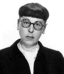 Edith head  pictured in her famous eyeglasses  1955