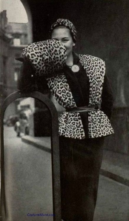 Model wearing an ensemble with leopard skin by pierre balmain  1950.