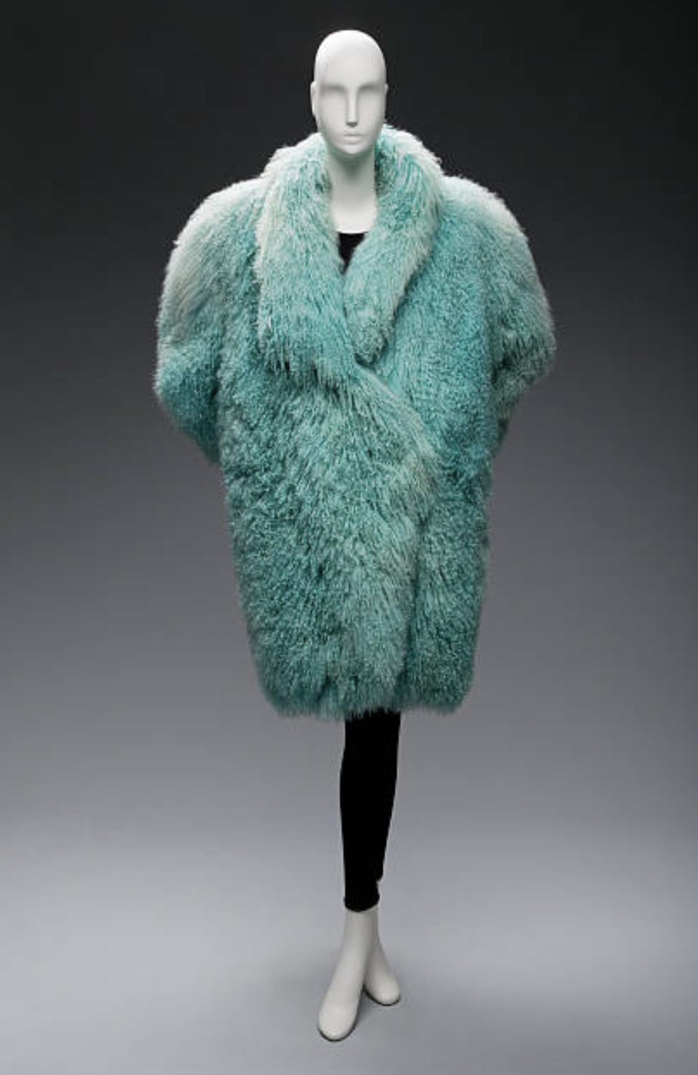 Coat made of fluffy blue sheepskin  designed by claude montana  circa 1980s