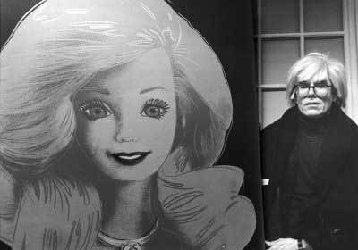  Andy Warhol , With his painting, Barbie, 1986 