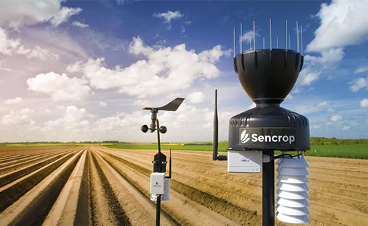 A farmer uses Trimble Select partner Sencrop to gather environmental data on their farm.