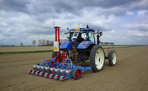 A farmer uses Trimble's Autopilot automated steering system to add precision to  their planting activities.
