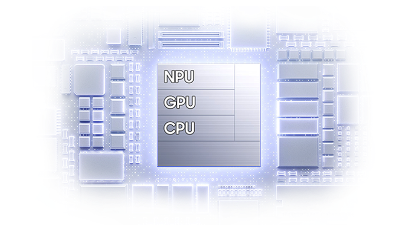 Närbild av ett datorchip med NPU, GPU och CPU-komponenter i blåtonad belysning på ett kretskort.